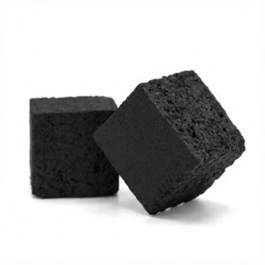 Close up of unlit CocoUS 25mm charcoal cubes showing dense texture and sharp edges